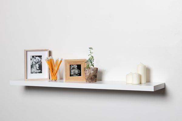 Flexi Storage Decorative Shelving Floating Shelf White Gloss 1200 x 240 x 38mm fitted on wall with decorations on top