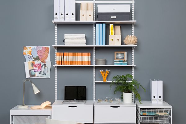 Flexi Storage Home Solutions Timber Shelf White 600x200x16mm mounted on Home Solutions Double Slot System and used as shelving in office setup