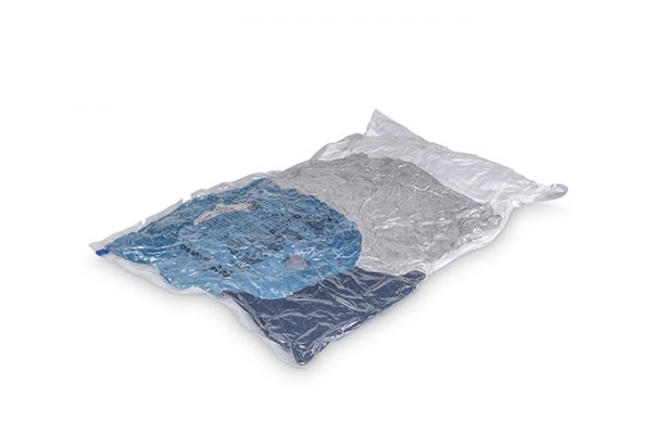 Flexi Storage Vacuum Storage Bag filled with clothing and compressed isolated