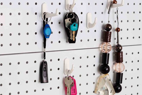 Flexi Storage Home Solutions Pegboard Hooks Small White fitted to Home Solutions Pegboard with various items hanging