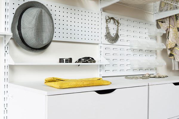 Flexi Storage Home Solutions Pegboard White fitted in a wardrobe setup